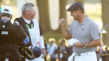 bryson dechambeau caddie fist bump