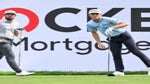 Cameron Young watches Will Zalatoris' tee shot at 2022 Rocket Mortgage Classic