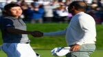 Collin Morikawa shakes hands with Tiger Woods on the 18th hole on the South Course during the second round of the Farmers Insurance Open golf tournament at Torrey Pines Municipal Golf Course on January 24, 2020.