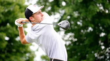 David Puig tees off during the first day of the LIV Golf Invitational at Trump National Golf Club in Bedminster, N.J., on July 29.