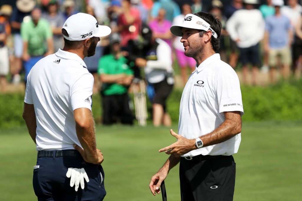 ST LOUIS, MO - AUGUST 09: Dustin Johnson of the United States talks with Bubba Watson on the 11th green during the first round of the 2018 PGA Championship at Bellerive Country Club on August 9, 2018 in St Louis, Missouri. (Photo by Streeter Lecka/PGA of America/PGA of America via Getty Images)