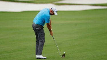 Marc Leishman hits a shot.