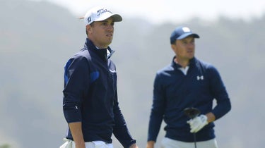 justin thomas and jordan spieth look on