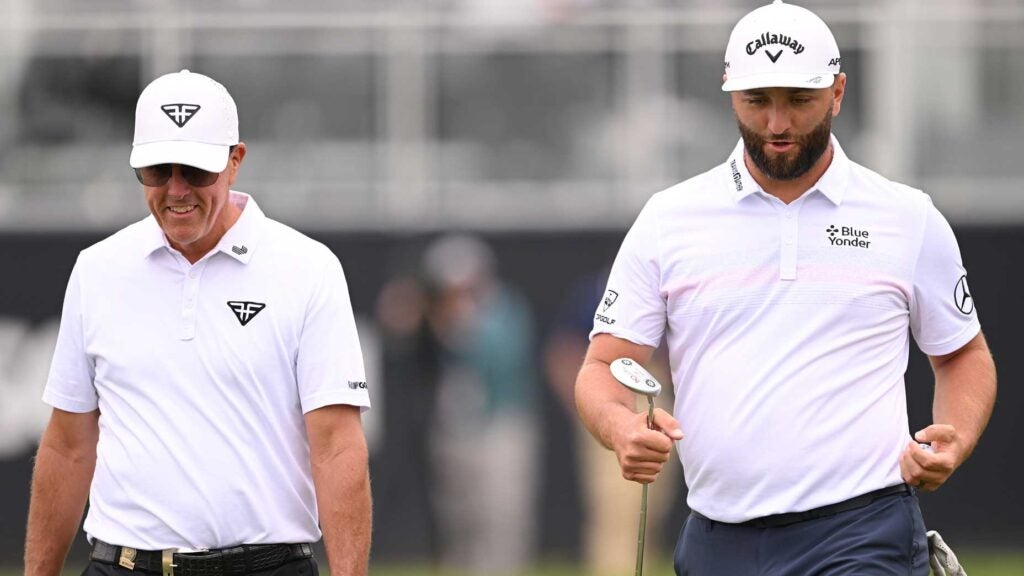 phil mickelson talks to jon rahm