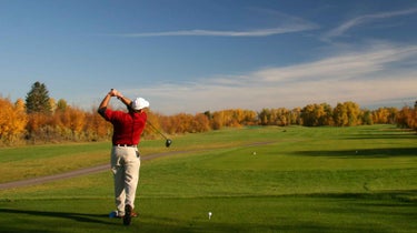 man takes practice swing