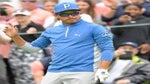 Rickie Fowler waves to the crowd on Thursday.