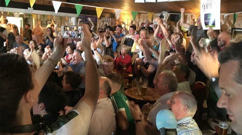 Lowry fans in the Esker Hills clubhouse cheer their man as he clinches his Open Championship victory.