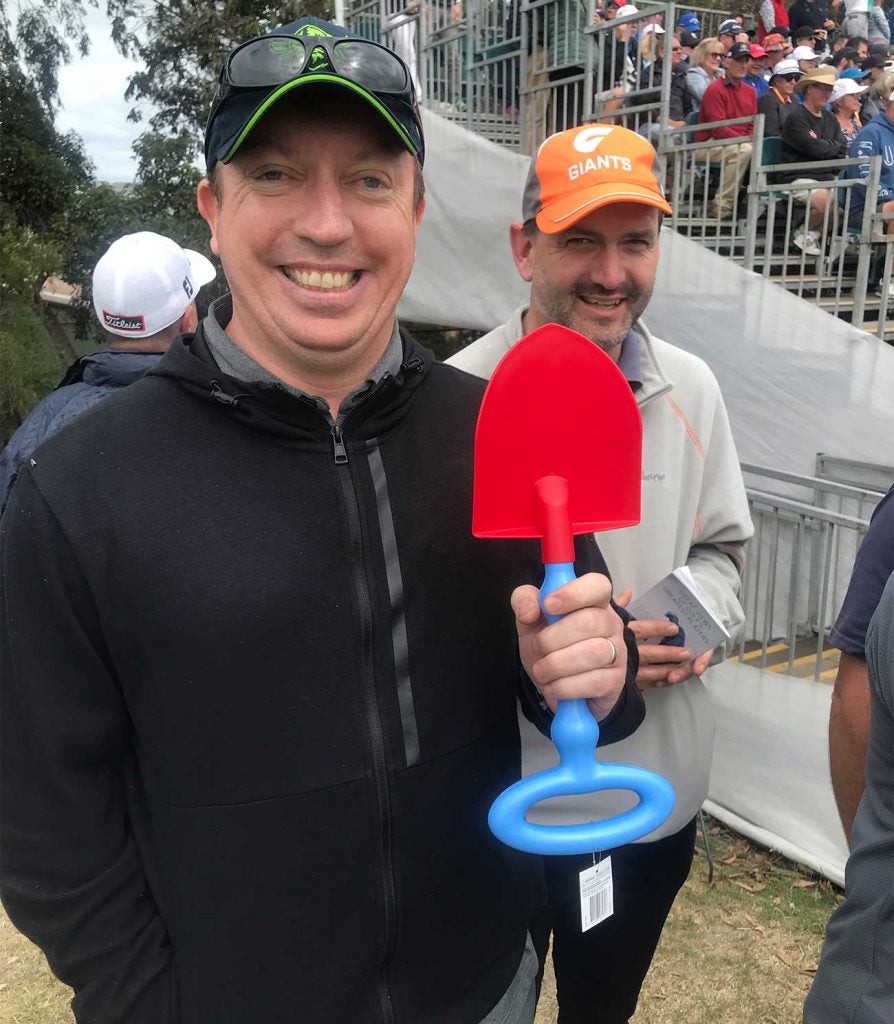 Patrick Reed heard it from several fans on Thursday, including this one who bought a shovel for the occasion.