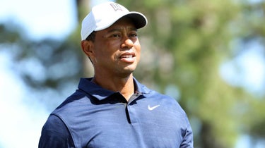 Tiger Woods of the United States looks on from the fourth hole during a practice round prior to the Masters at Augusta National Golf Club on April 04, 2022 in Augusta, Georgia.