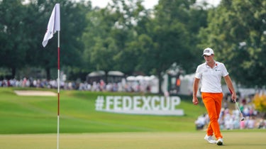 Viktor Hovland of Norway walks the green of hole #8 before his putt at East Lake Golf Course on August 26, 2023 in Atlanta, Georgia.